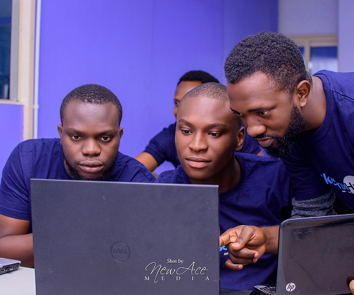 image of guys on a laptop