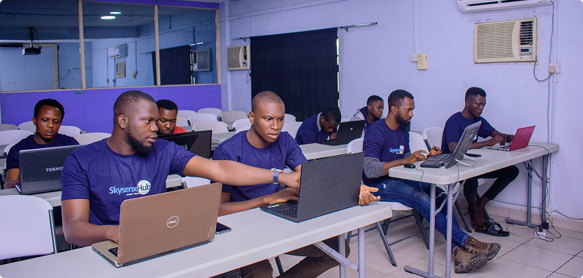 image of guys on a laptop